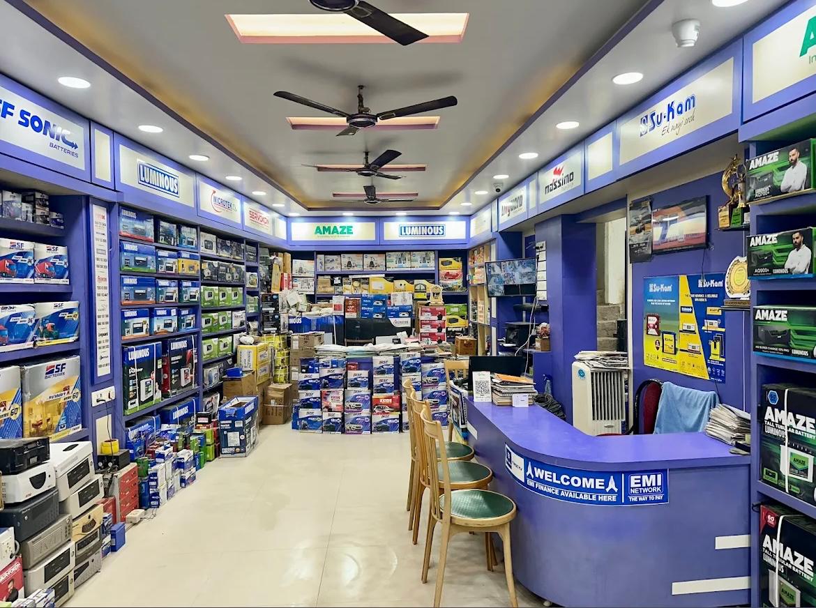 Ganga battery's shop interior with clean displays and knowledgeable staff helping customers